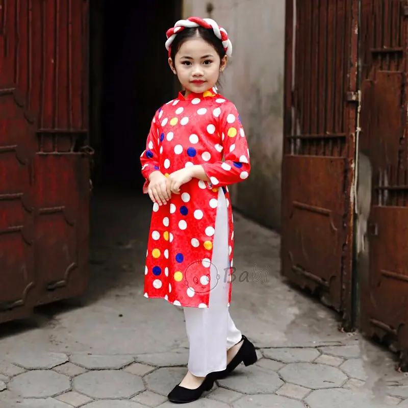Mẫu áo dài cô bai Sài Gòn chấm bi cho bé gái